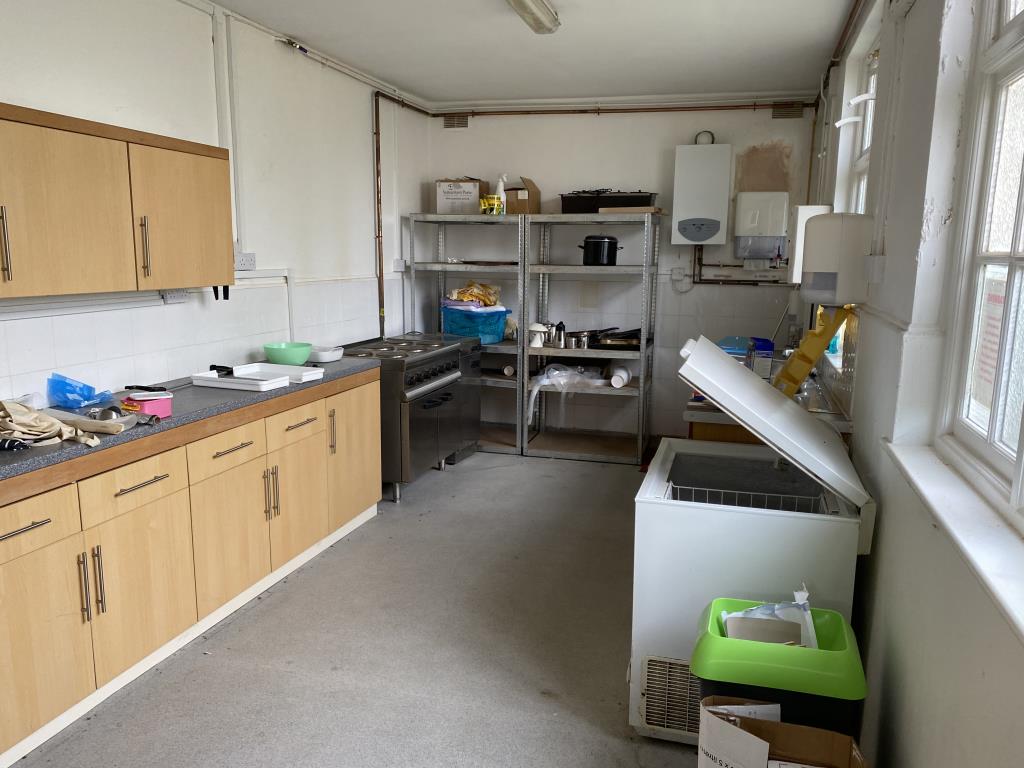 Lot: 100 - FORMER SALVATION ARMY CITADEL AND ADJOINING LAND WITH POTENTIAL - Fitted kitchen with two rear windows